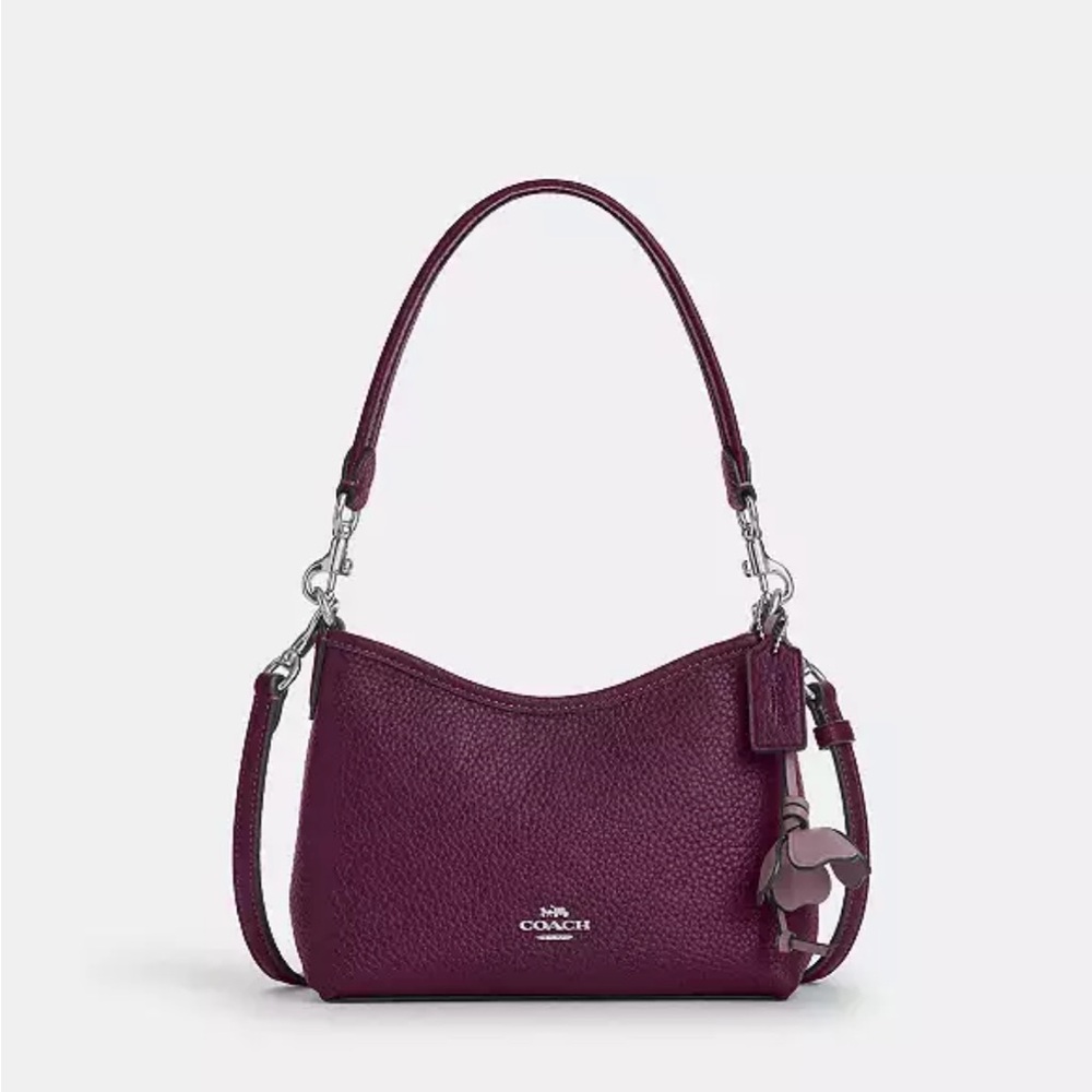 Coach Laurel Small Shoulder Bag
With Flower Charm Plum color🎀